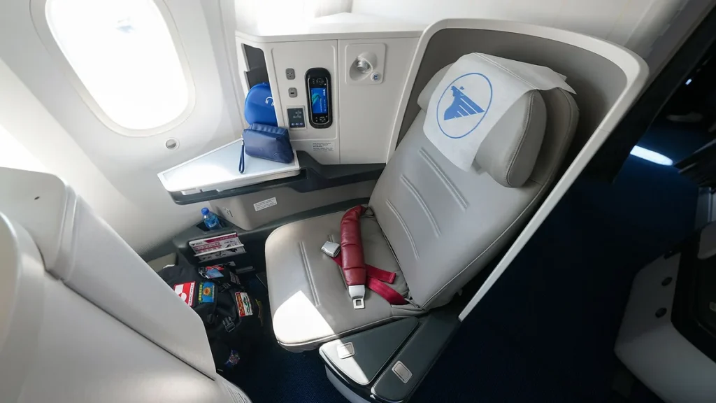 Lie-flat business class seat on a long-haul aircraft