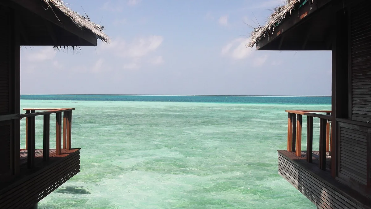 View from the deck of an overwater villa in the Maldives